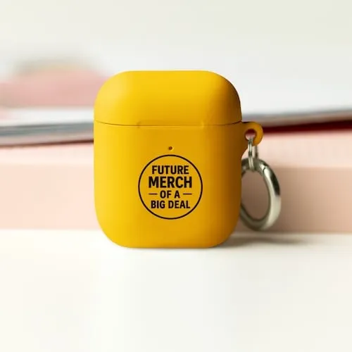 A yellow Airpods case with black text that says Future Merch of a Big Deal representing tech accessory promotional products available in our store for same-day online ordering in Boston .